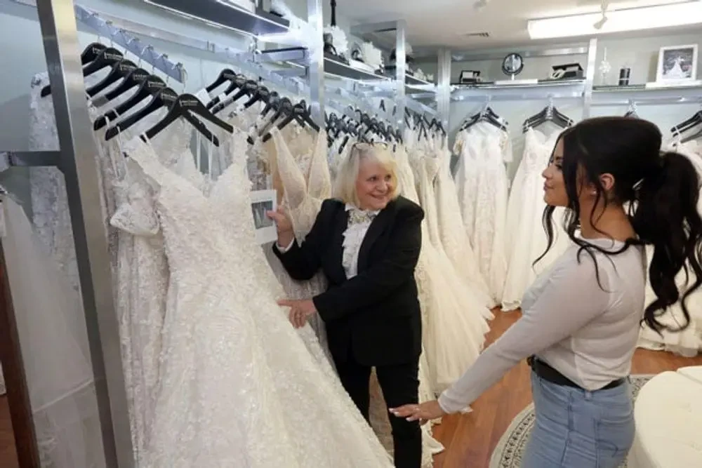 Searching for the perfect wedding dress. Desktop Image