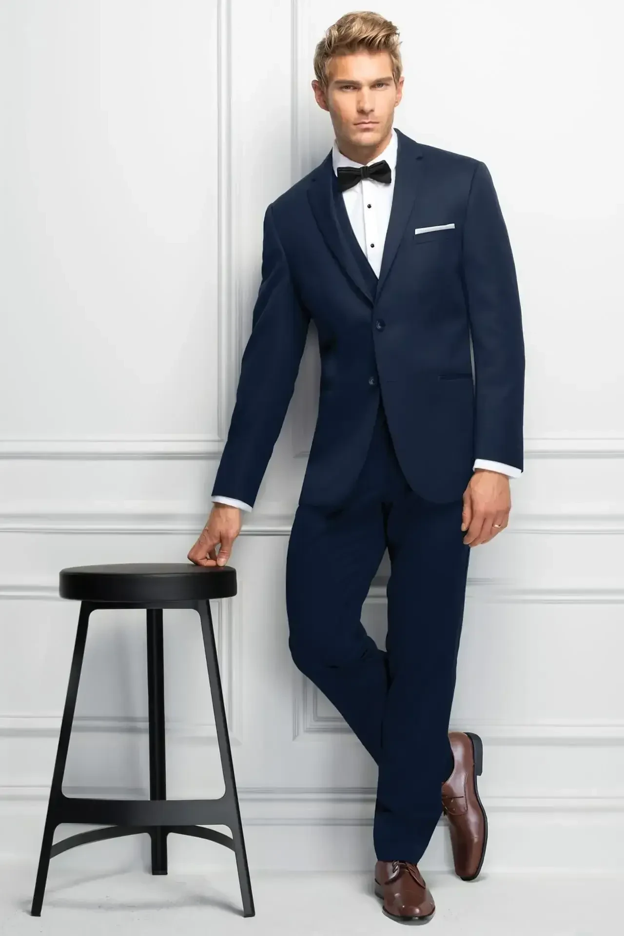 Model wearing tuxedo